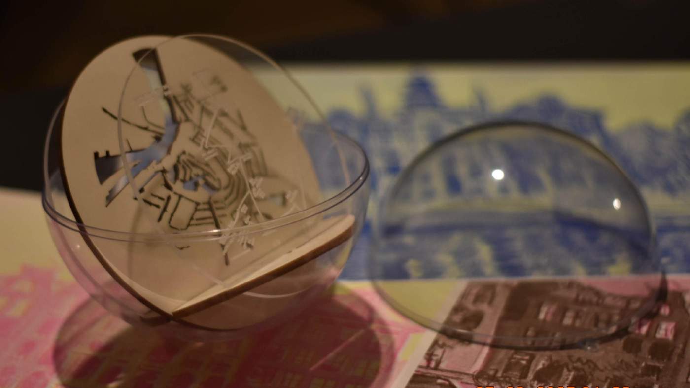 Two spheres with Amsterdam illustrated map background